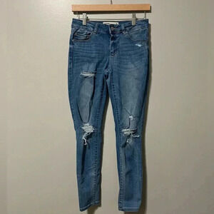 Garage Mid Rise Skinny  Destroyed Jeans Medium Faded Wash